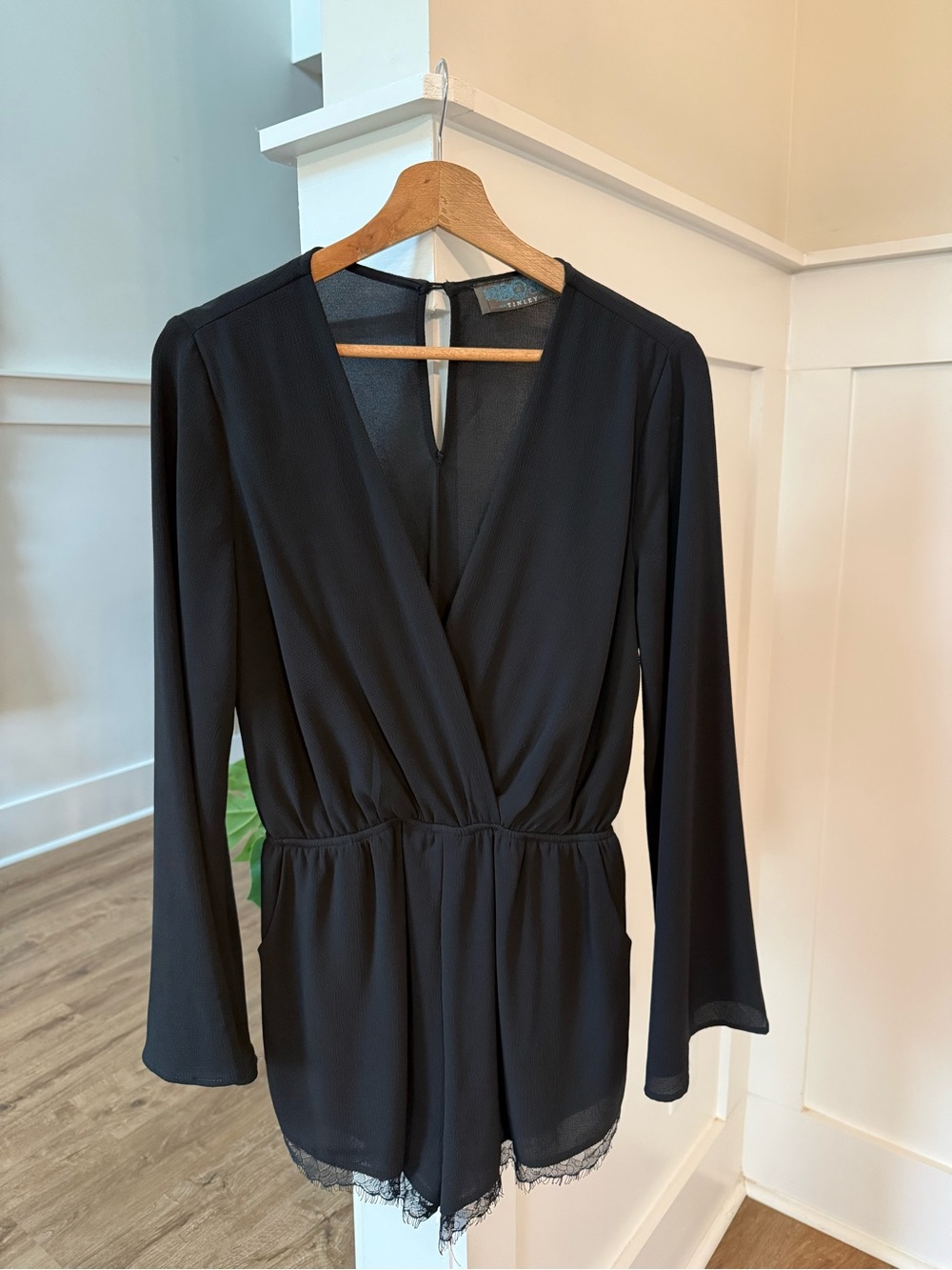 Black Long-Sleeve Surplice Romper with Lace Trim